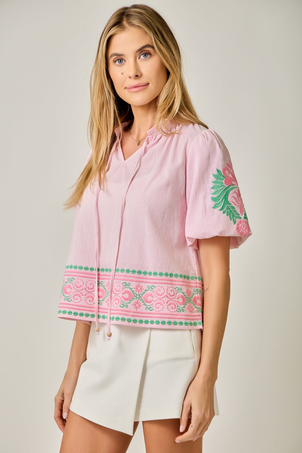 Abstract Embroidered Pinstripe Blouse with Ruffled Mock Neck & Beaded Tie